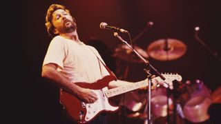 Guitarist Eric Clapton performing on stage, 1986