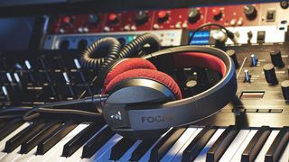 Focal Listen Professional headpones sat on the keys of a synth