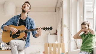 Singing and playing guitar